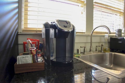 Everything you need, including Kcup coffee and machine, even down to clean sponges for the sink, is provided.