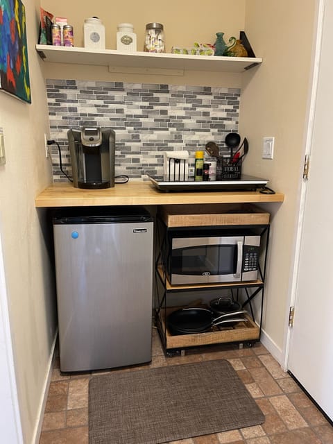 Fridge, microwave, stovetop, coffee/tea maker