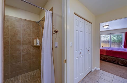 Combined shower/tub, hair dryer, towels, soap