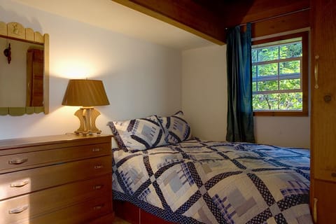 1 bedroom, desk, iron/ironing board, travel crib
