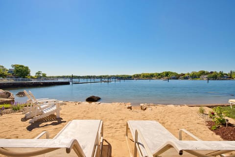 On the beach, sun loungers, beach towels