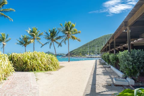 On the beach, sun loungers, beach towels