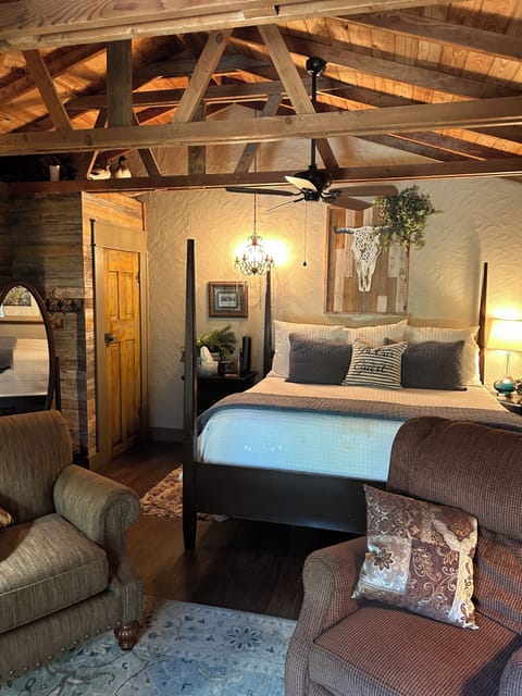 King poster bed, closet door to left