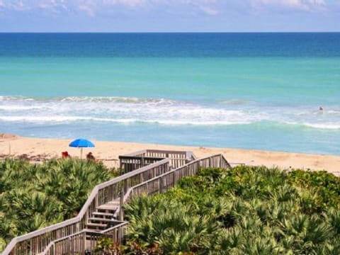 On the beach, sun loungers, beach towels