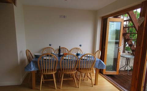 Dining area with bi fold doors into the garden.