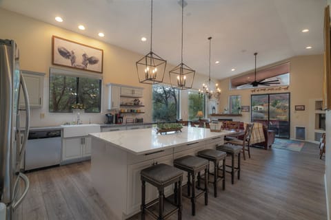 New cabinets, light fixtures and countertops are in the remodeled kitchen.