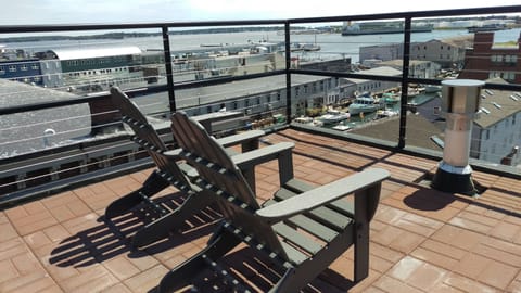 Semi-private rooftop deck.Other units deck is on opposite side of building.