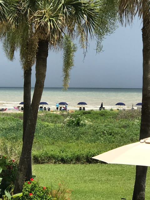 On the beach, sun loungers, beach towels