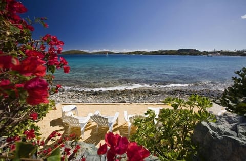 On the beach, sun loungers, beach towels