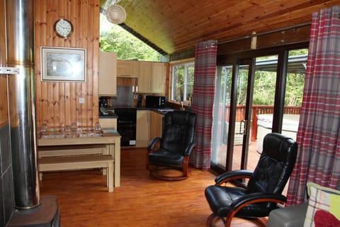 living area with patio doors to hot tub