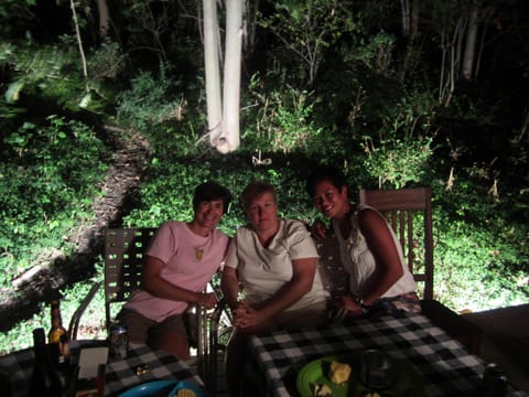 Back Deck at night (with lights on the trail/woods/hillside behind)