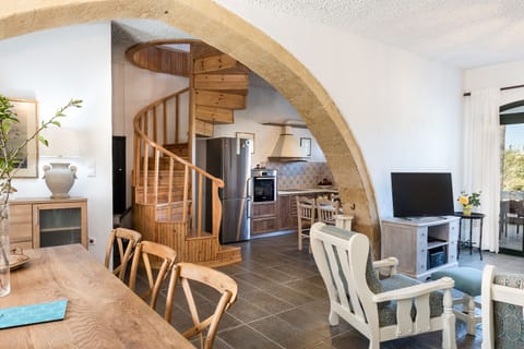 A wodden ladder that guides to the upper floor.