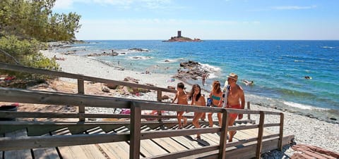 Beach nearby, sun loungers