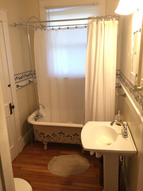 Combined shower/tub, hair dryer, towels, soap