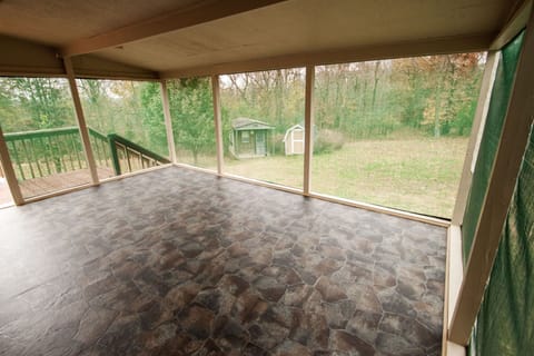Screened in porch on back of house