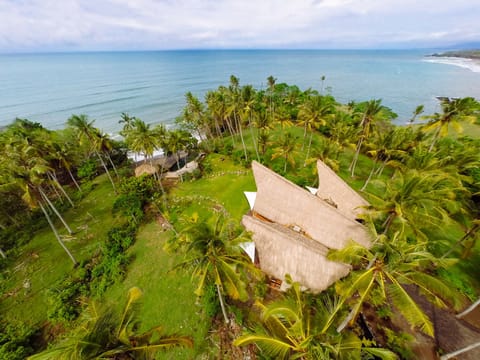 Aerial view of the main house and Balian beach