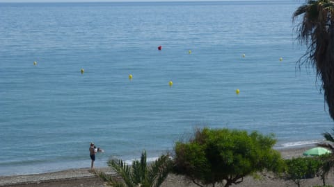 On the beach, sun loungers