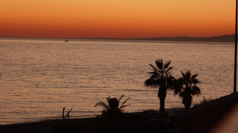 On the beach, sun loungers