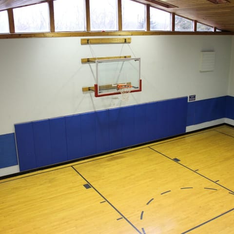 Indoor Basketball Court 50 X 30 Wood Floor with sleepers and glass backboard