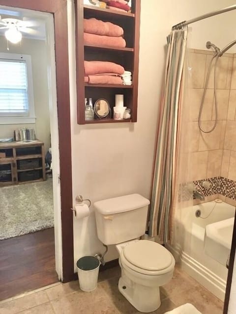 Combined shower/tub, hair dryer, towels, soap