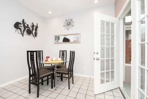 Dining room is open to sunroom, kitchen and living room