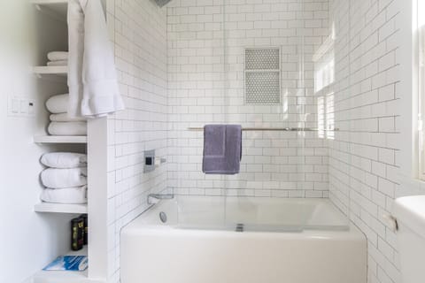 Combined shower/tub, hair dryer, towels, soap