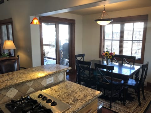 Dining area opens to the covered deck