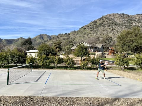 Enjoy your own private Pickleball Court right between the house & the river!!