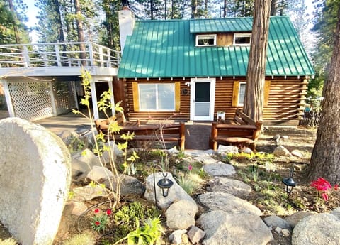 1950's solid log cabin nestled in King Beach, CA six blocks up from the lake.