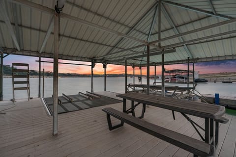 Enjoy time with family and friends on the dock.  Dock has Jet ski and boat lift available for guest use as well as boat rental.