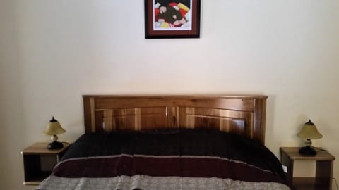 Full bed made of solid laurel wood