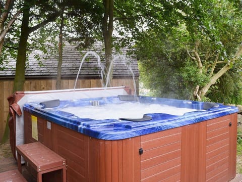 Large Hot Tub which seats 8. Also outside TV