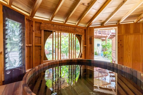 Private hot tub accommodates up to four adults.