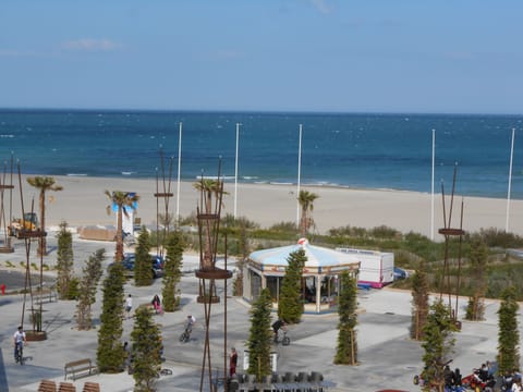 On the beach, sun loungers