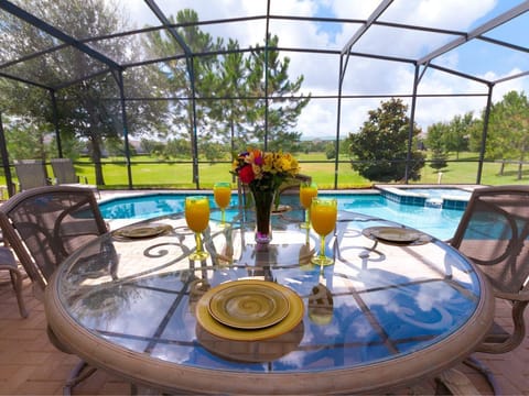 Enjoy breakfast at our private pool. True South-Facing with No Rear Neighbors!