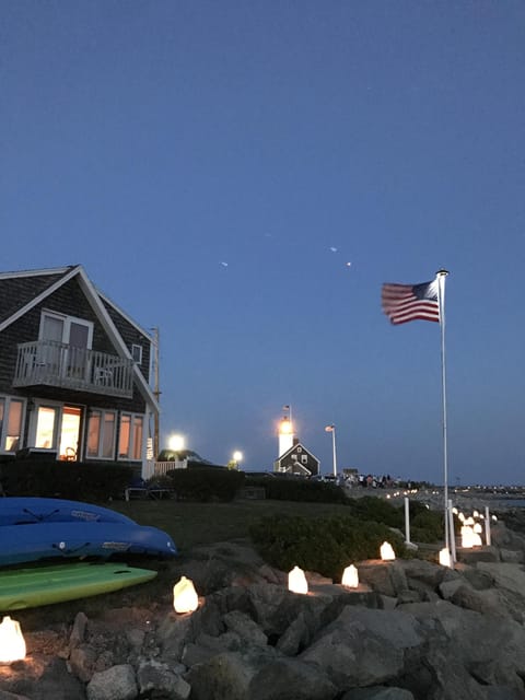 The house during the Scituate Luminaria where candles are lit on the harbor
