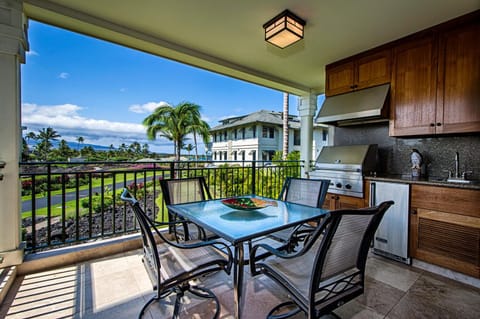 Lanai with patio set, Viking gas grill, beverage cooler, and sink.