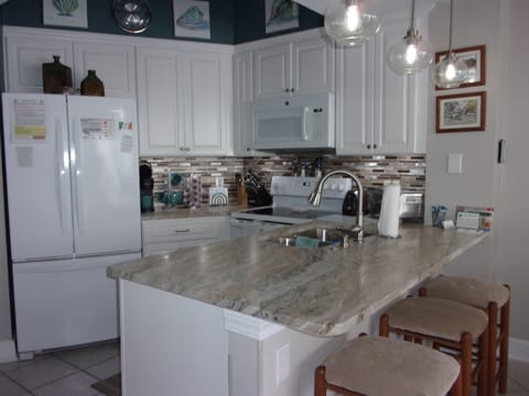 Bar stools at the counter for additional seating.