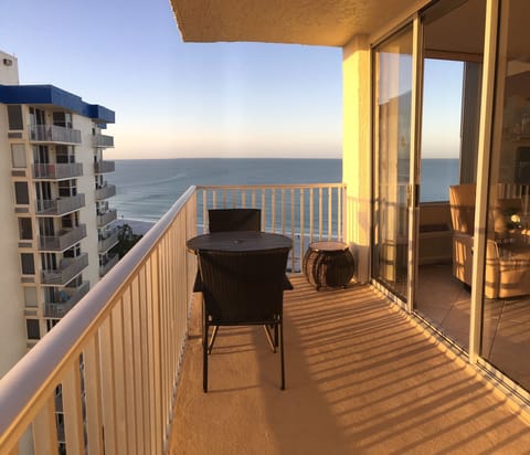 Panoramic water views from our 11th floor balcony - dolphins, sunrises & sunsets