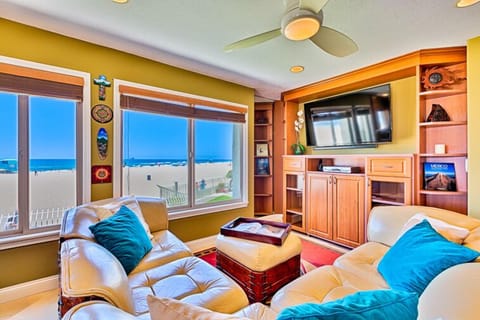 Living room with ocean, beach and strand view.  Smart TV with cable and Wi-Fi