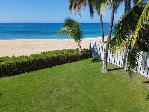 On the beach, sun loungers, beach towels