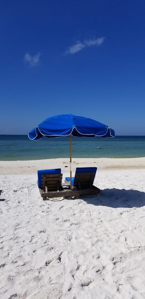 On the beach, sun loungers