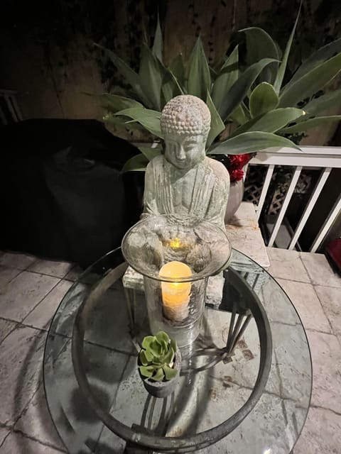 Buddha sculpture in meditation garden.