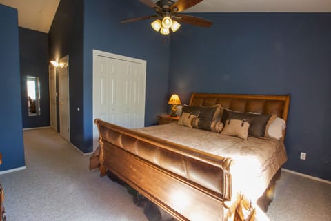 Master bedroom upstairs has king size bed, dresser, ceilingfan, & 3 lrg closets.