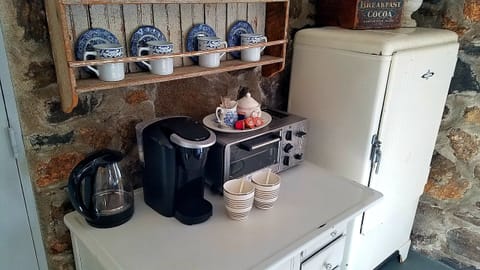 Fridge, coffee/tea maker, electric kettle, toaster