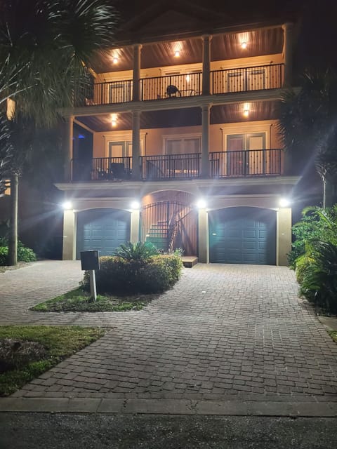 FRONT OF HOUSE AT NIGHT