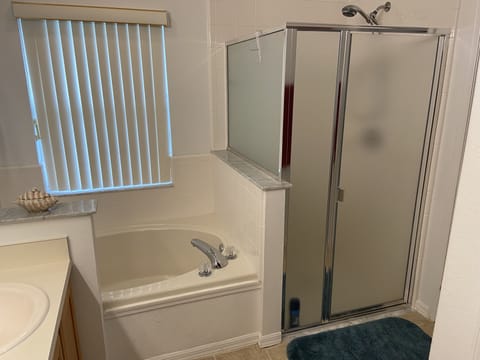 Combined shower/tub, hair dryer, towels, soap