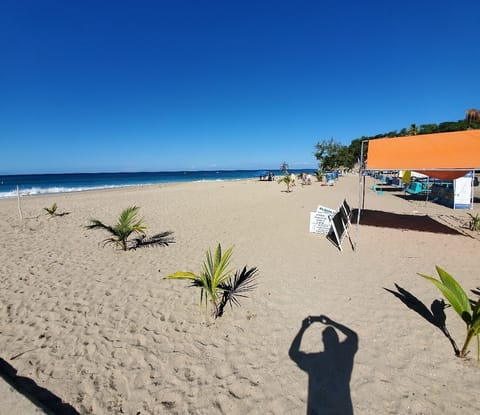 On the beach, sun loungers