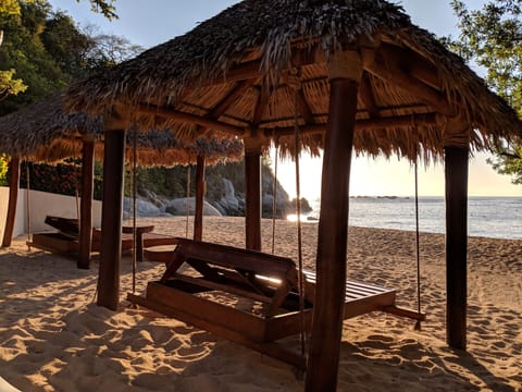 On the beach, sun loungers, beach towels