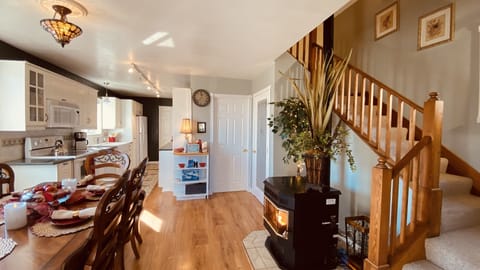 ENTER DINING ROOM. STAIRS TO MASTER BEDROOM, QUEEN BDR AND LOFT COMMON AREA.